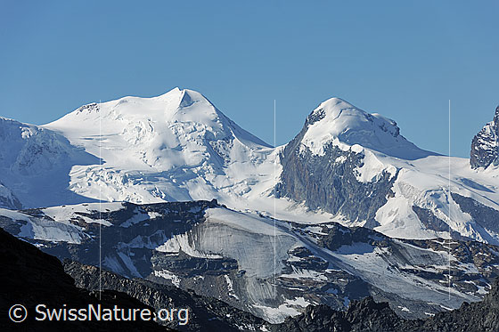 Foto: Zwillinge Castor und Pollux mit Zwillingsgletscher und Schwärzegletscher. Die Übergänge Felikjoch, Zwillingsjoch und Schwarztor sind gut erkennbar.
Vordergrund: Stockhorn und Triftjigletscher