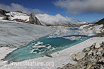 F076840: Wolkenstimmung am Gletschersee
